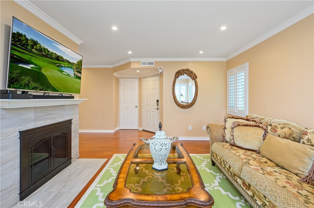 36 Corniche Drive, Unit B Dana Point, CA 92629 - Photo 4 of 37 Fireplace with tile framing the hearth