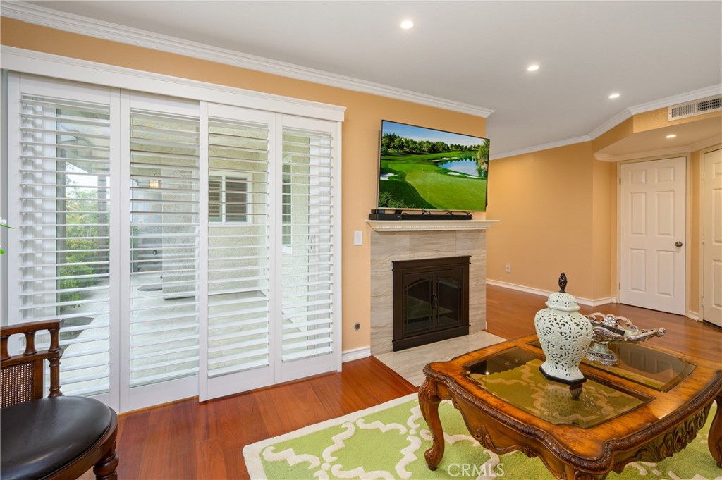 36 Corniche Drive, Unit B Dana Point, CA 92629 - Photo 5 of 37 Plantation wood shutters on sliding doors