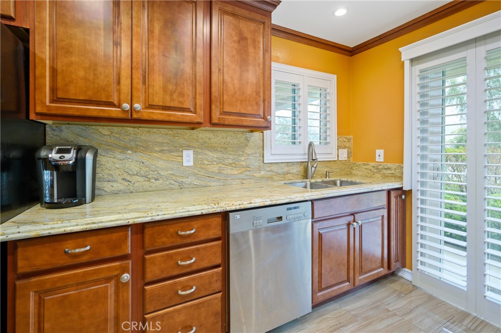 36 Corniche Drive, Unit B Dana Point, CA 92629 - Photo 9 of 37 Newer cabinetry in the kitchen