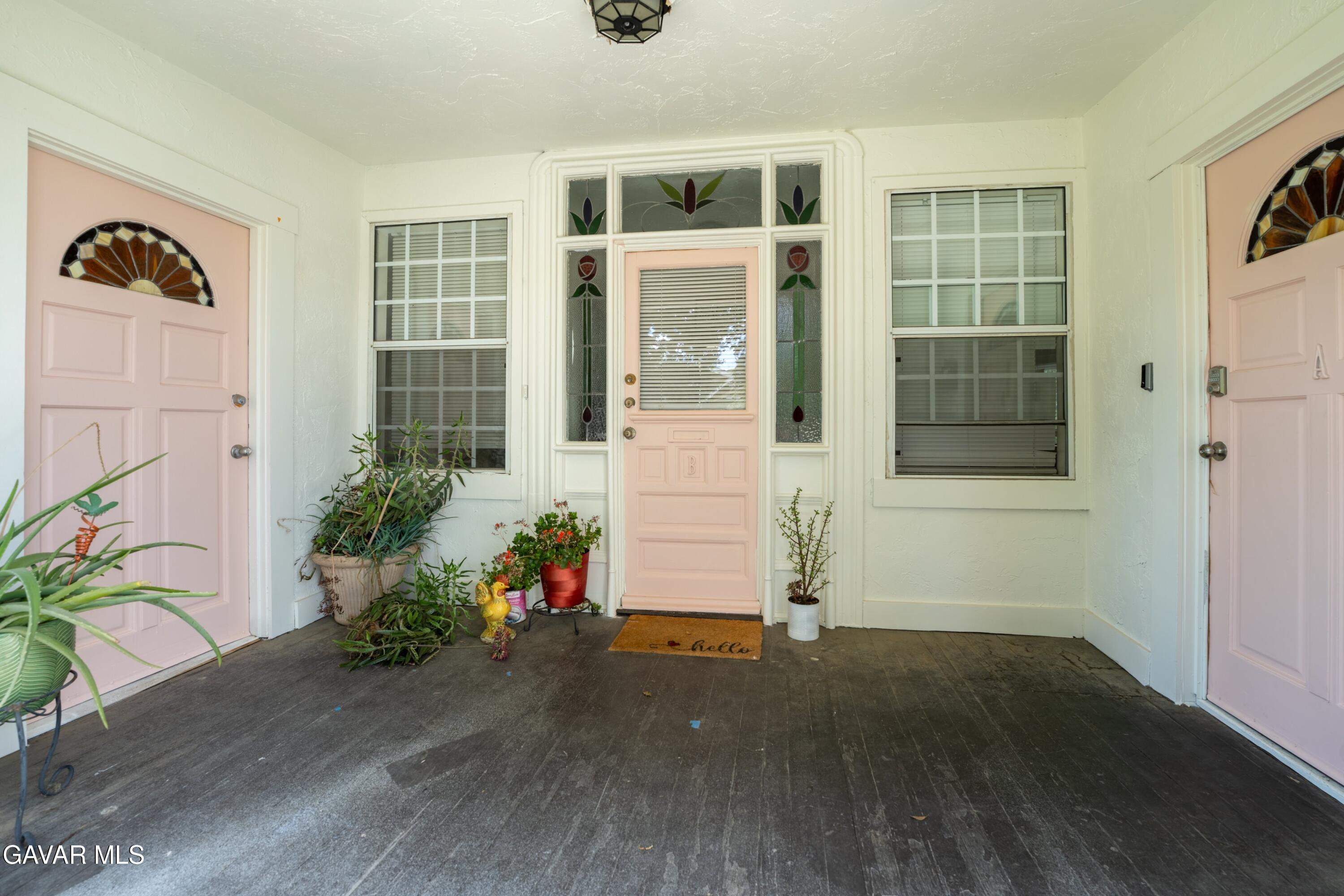 2702 19th Street Bakersfield, CA 93301 - Photo 5 of 21 a front view of a house with a yard