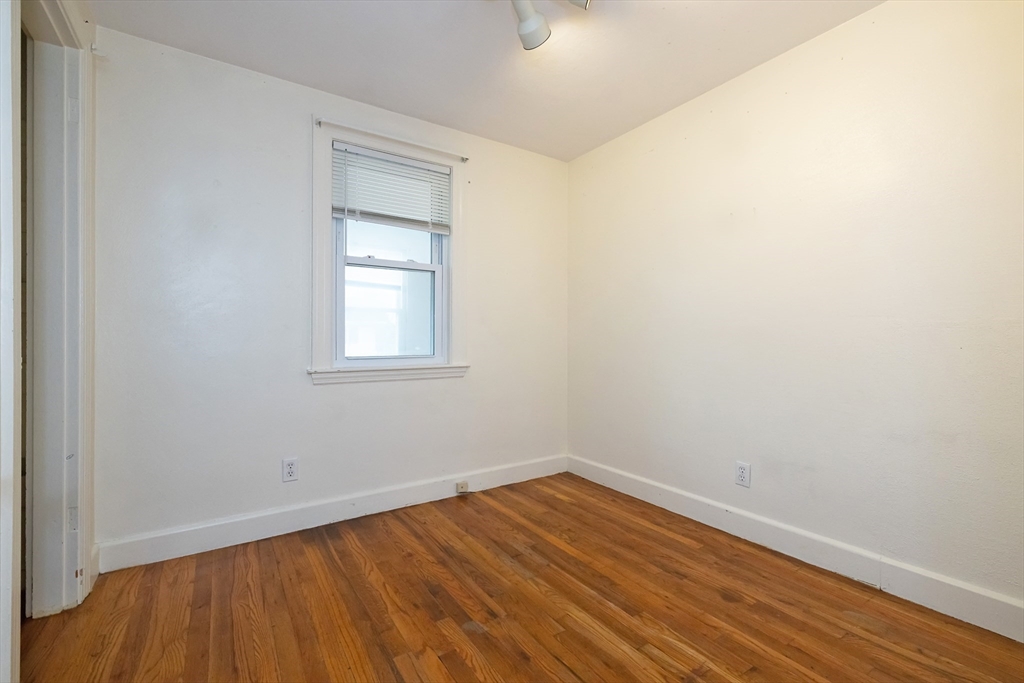43 E Street Hull, MA 02045 - Photo 12 of 12 a view of a room with wooden floor and windows