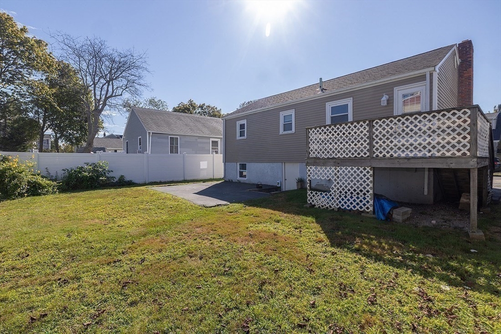 43 E Street Hull, MA 02045 - Photo 10 of 12 a front view of a house with a yard and seating space