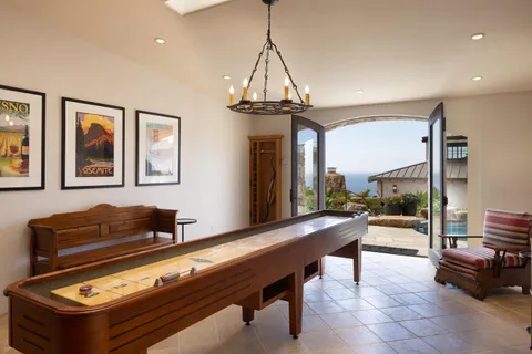 a view of a dining room with furniture