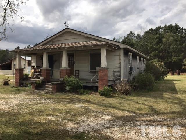 370 Randall Chapel Road Dunn, NC 28334 - Photo 2 of 10 a view of a house with backyard