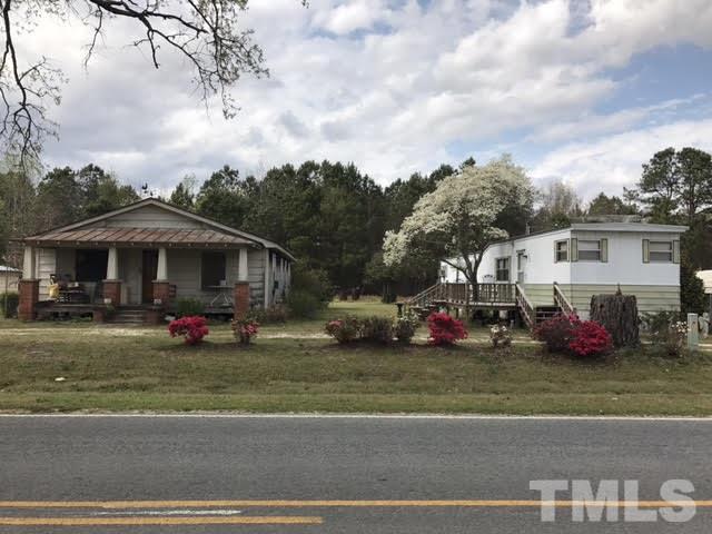 370 Randall Chapel Road Dunn, NC 28334 - Photo 3 of 10 a view of a town with lot of cars parked on the side of the road
