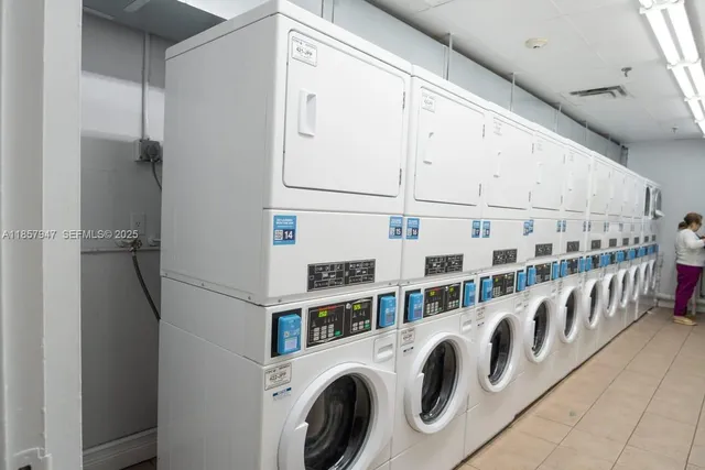 a view of an entryway with washer and dryer