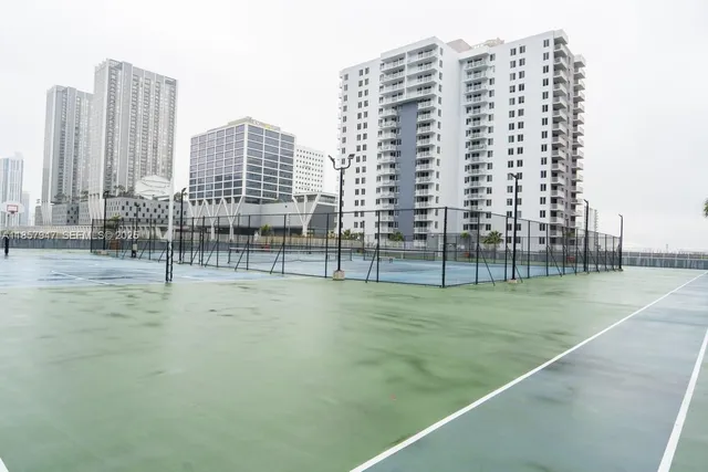 a view of outdoor space with tall buildings