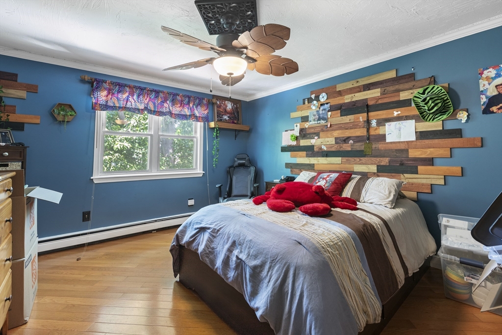 20 1/2 Bliss Street, Unit 2 Taunton, MA 02780 - Photo 14 of 18 a bedroom with a bed and window