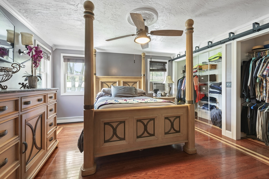 20 1/2 Bliss Street, Unit 2 Taunton, MA 02780 - Photo 16 of 18 a living room with furniture and a flat screen tv
