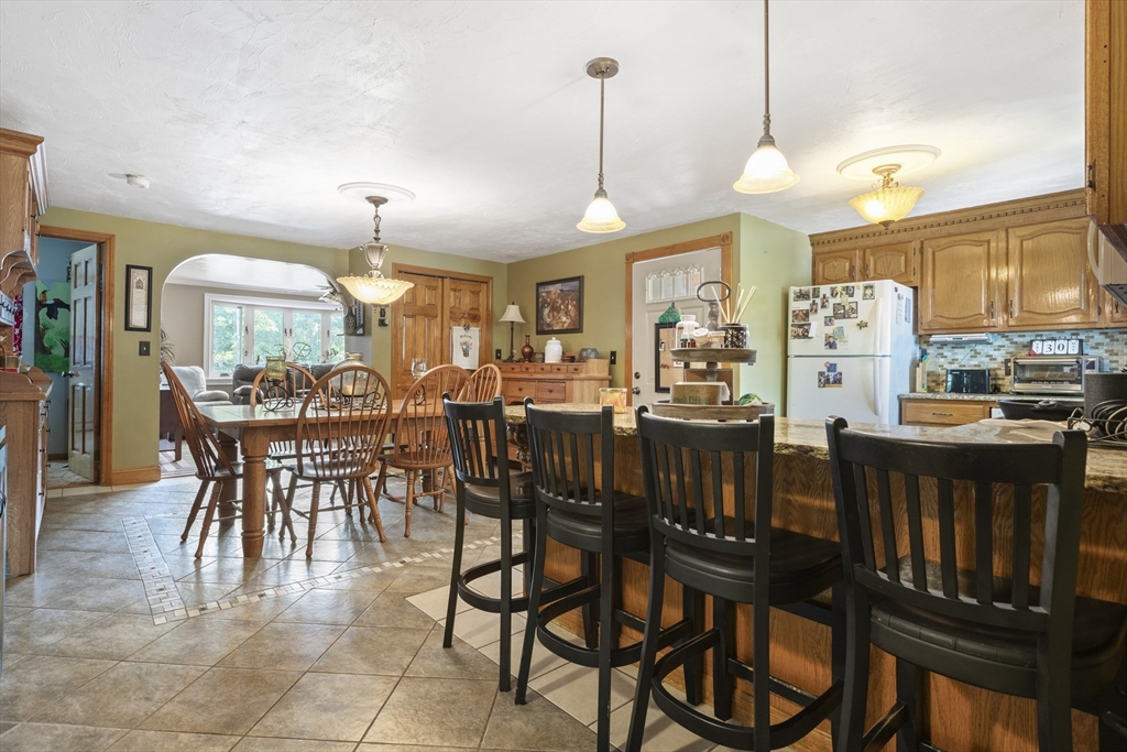 20 1/2 Bliss Street, Unit 2 Taunton, MA 02780 - Photo 6 of 18 a view of a dining room with furniture