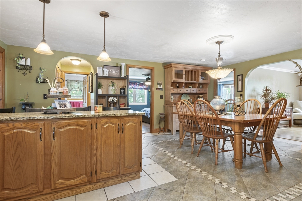 20 1/2 Bliss Street, Unit 2 Taunton, MA 02780 - Photo 8 of 18 a view of a dining room and chairs in a room