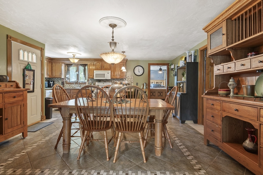 20 1/2 Bliss Street, Unit 2 Taunton, MA 02780 - Photo 9 of 18 a view of a dining room with furniture