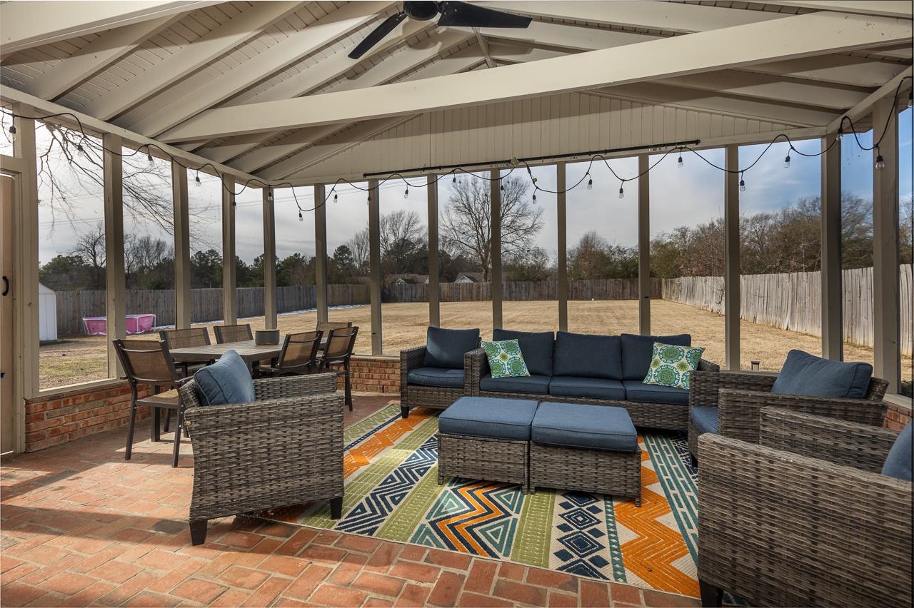 2835 McVay Trail Drive Memphis, TN 38119 - Photo 1 of 29 Screened in Sunroom with ceiling fan and vaulted ceiling with beams
