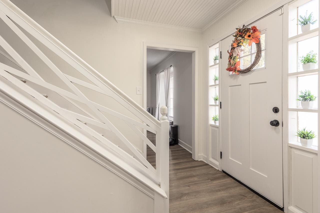 2835 McVay Trail Drive Memphis, TN 38119 - Photo 7 of 29 Entrance foyer featuring dark hardwood / wood-style floors and crown molding