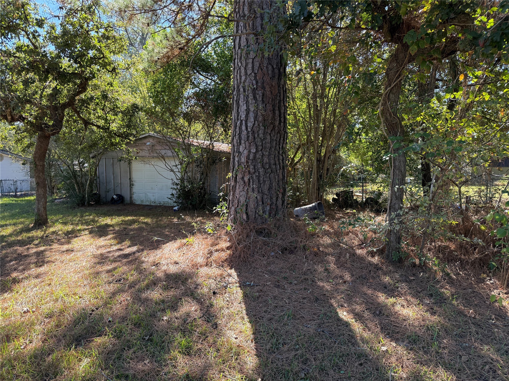 Lot 1 Easy Street Magnolia, TX 77355 - Photo 4 of 9 a backyard of a house with lots of green space
