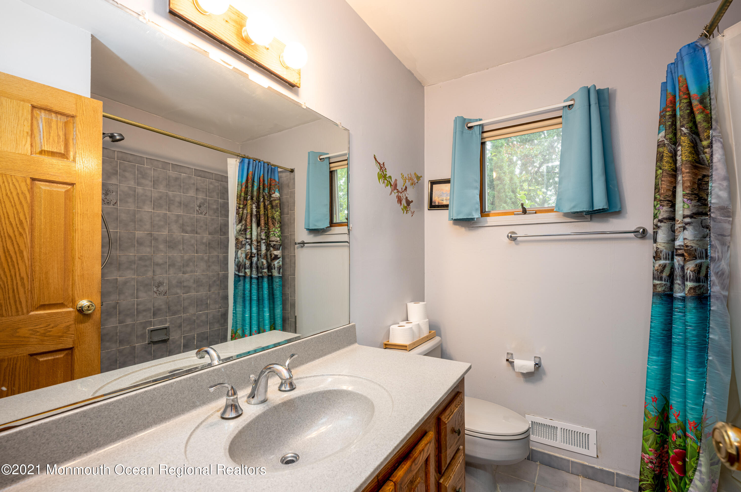 11 Darien Road Howell, NJ 07731 - Photo 14 of 21 a bathroom with a sink toilet and shower