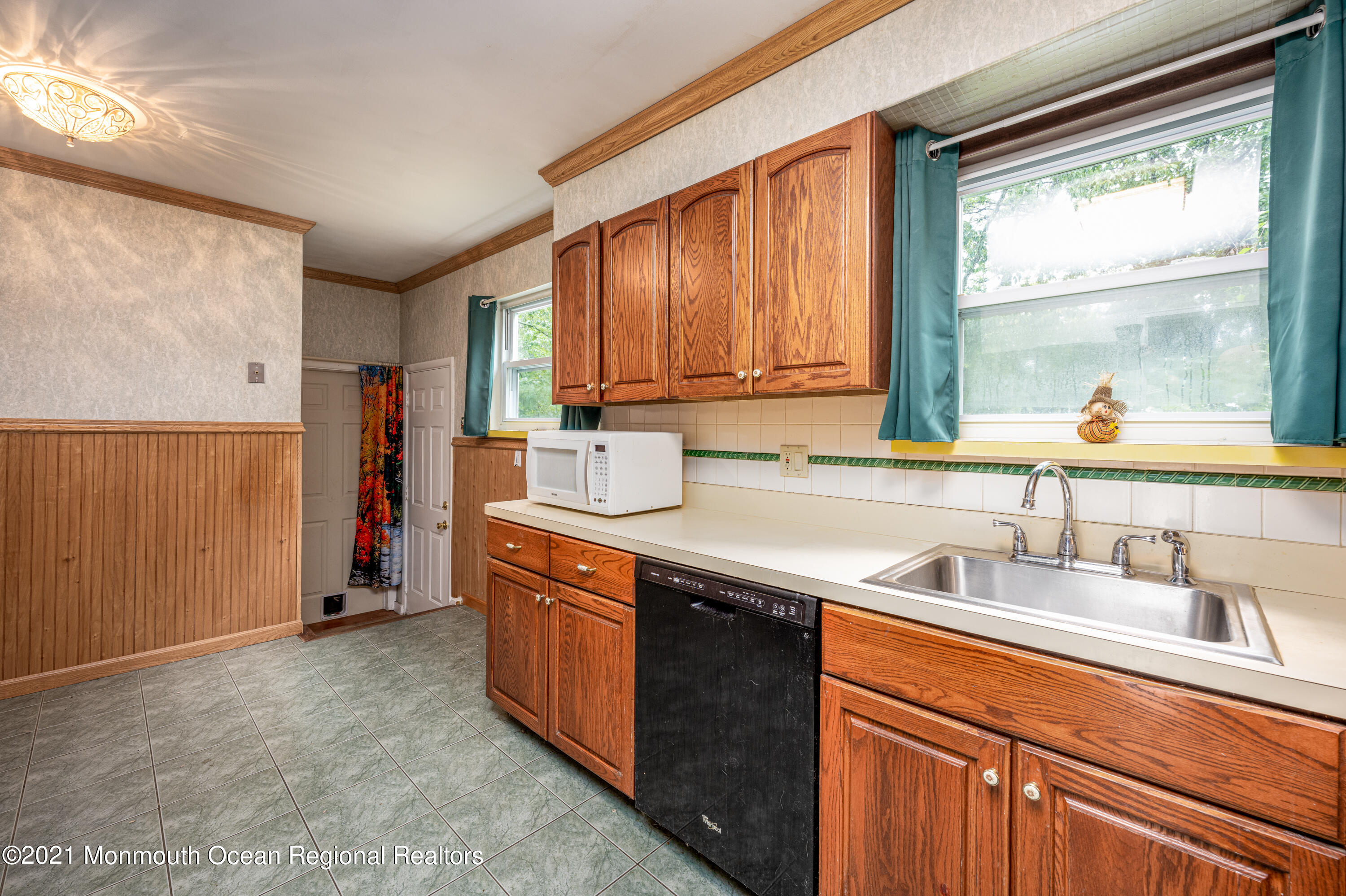 11 Darien Road Howell, NJ 07731 - Photo 8 of 21 a kitchen with stainless steel appliances granite countertop a sink stove and a window