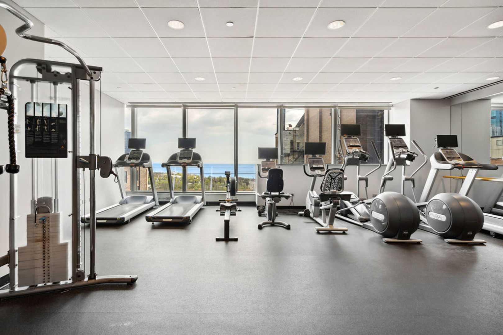60 East Monroe Street, Unit 2307 Chicago, IL 60603 - Photo 24 of 27 a view of a room with gym equipment