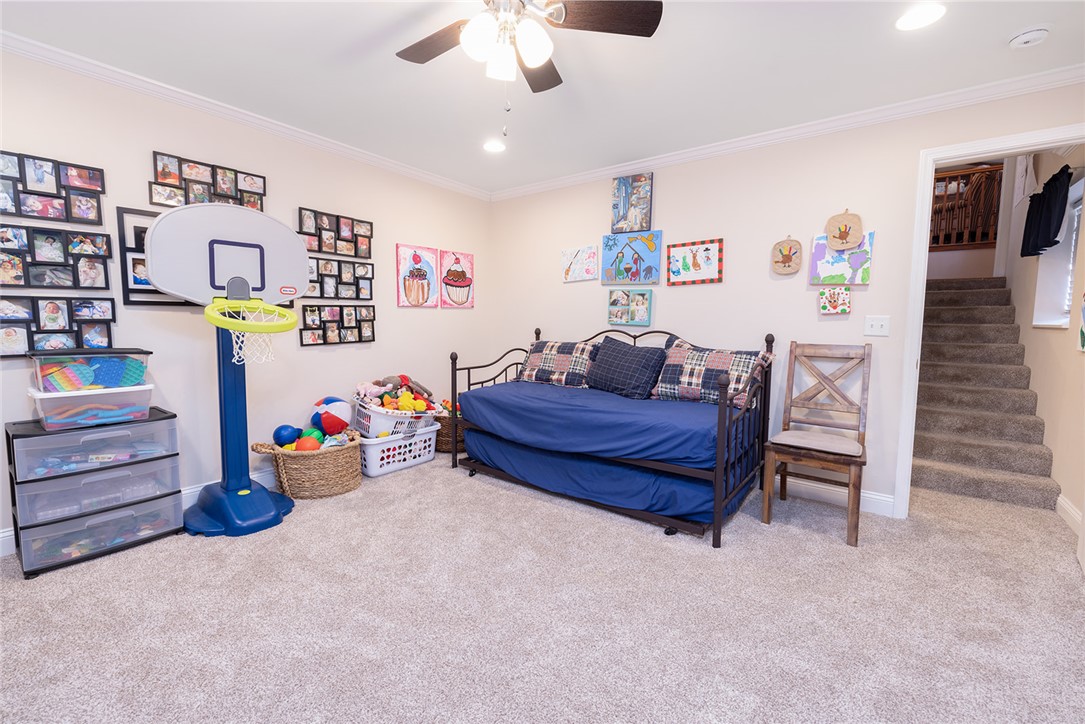 404 South Old Mill Road Seneca, SC 29678 - Photo 24 of 39 Soft wall-to-wall carpeting and neat crown molding define this versatile lower-level bonus space.