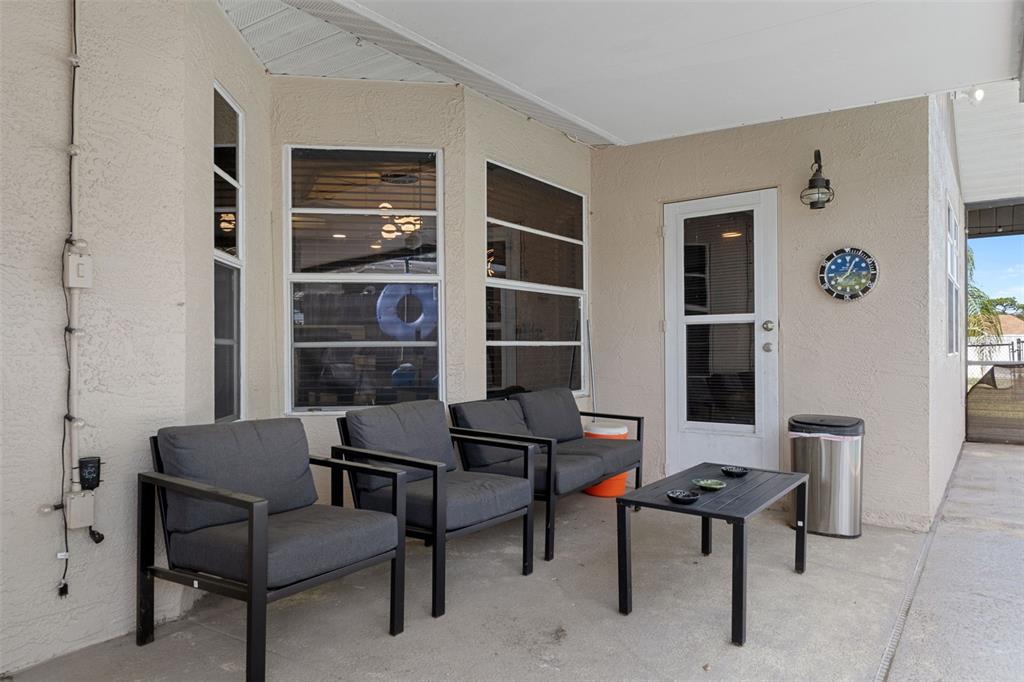 4355 Goldcoast Avenue Spring Hill, FL 34609 - Photo 25 of 30 a view of a livingroom with furniture and cabinet