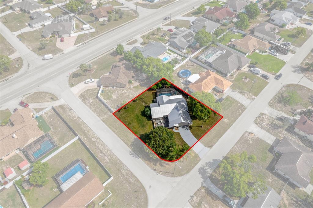 4355 Goldcoast Avenue Spring Hill, FL 34609 - Photo 29 of 30 with a view of a house with a yard