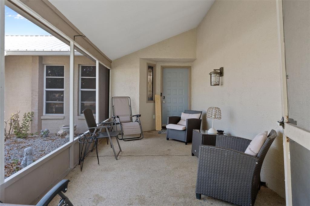 4355 Goldcoast Avenue Spring Hill, FL 34609 - Photo 6 of 30 a living room with furniture and windows