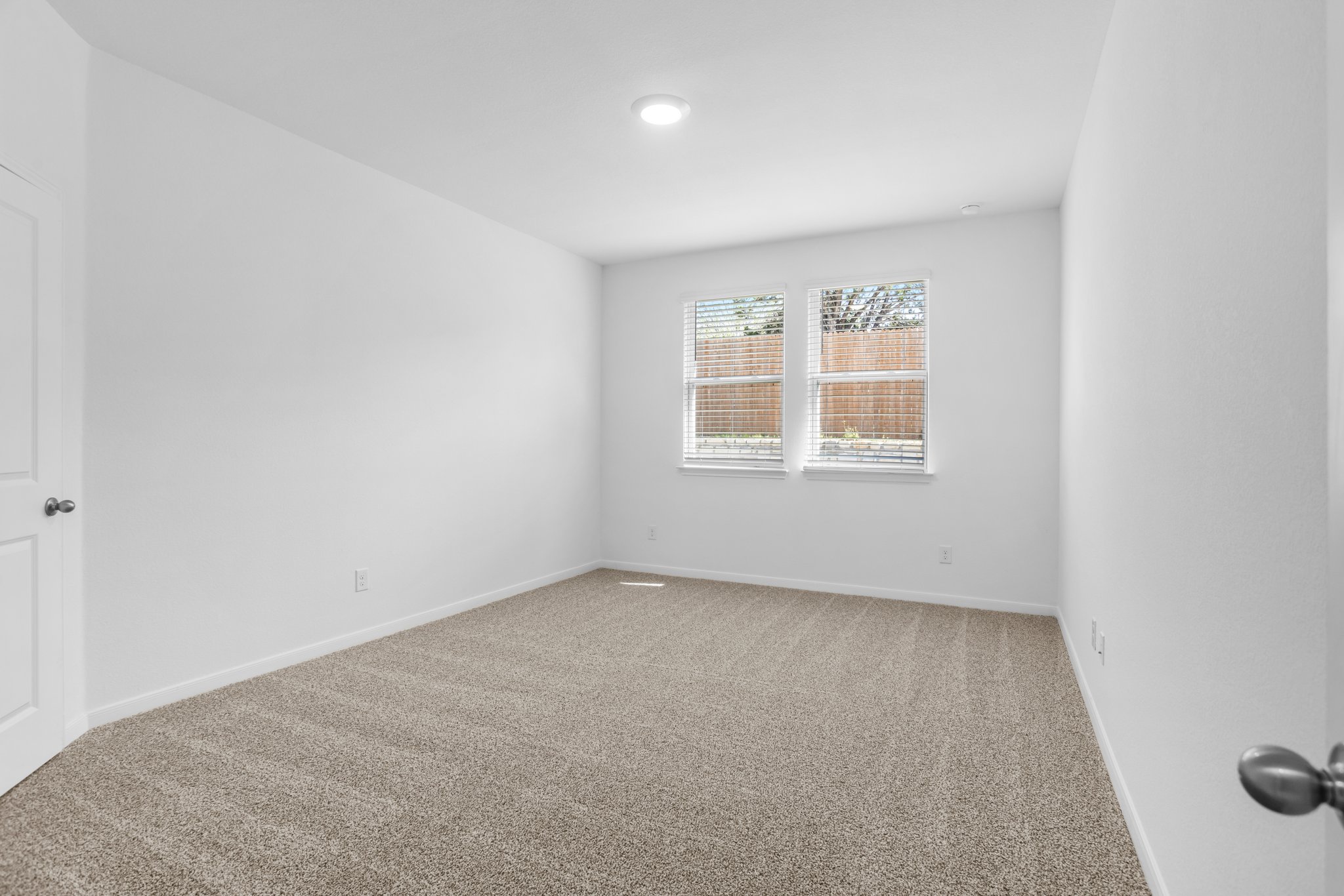 305 Brooks Ranch Drive Kyle, TX 78640 - Photo 19 of 32 an empty room with a window