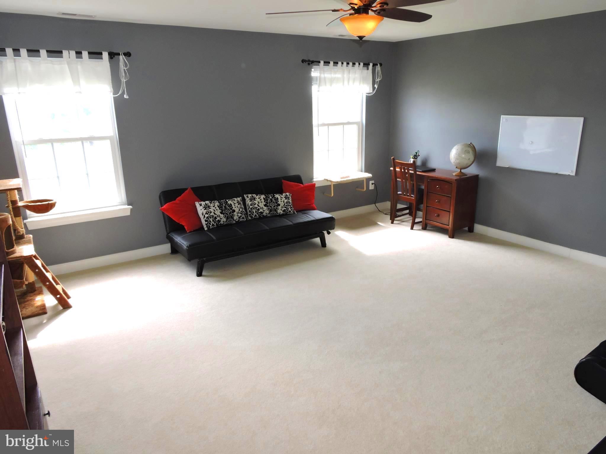 34 Wabash Road Inwood, WV 25428 - Photo 22 of 30 a living room with furniture and a window