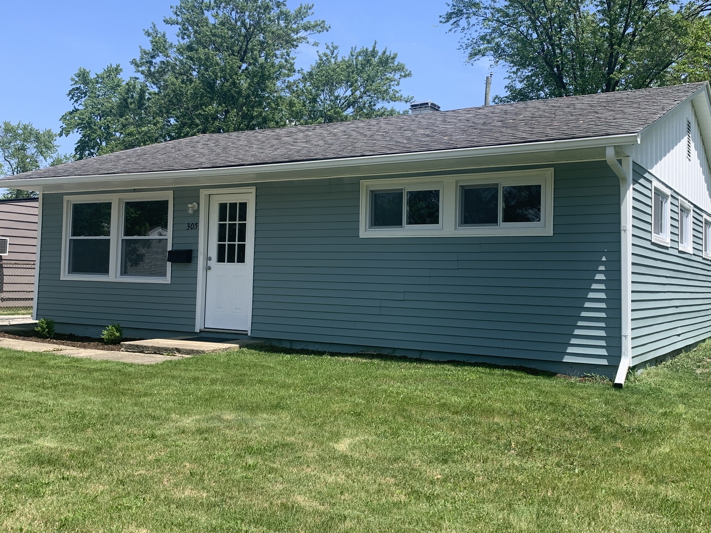 305 Tiverton Lane Steger, IL 60475 - Photo 2 of 13 a view of a house with a yard
