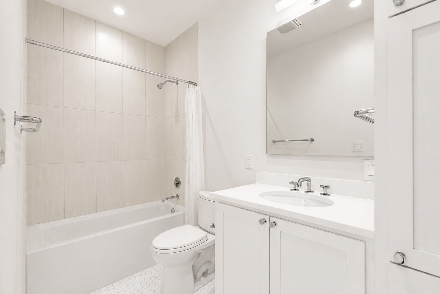 2520 Sutherland Street Austin, TX 78746 - Photo 21 of 26 This custom home has Two Primary Suites and this features a deep luxury Durvait soaking tub and shower with Waterworks fixtures.
