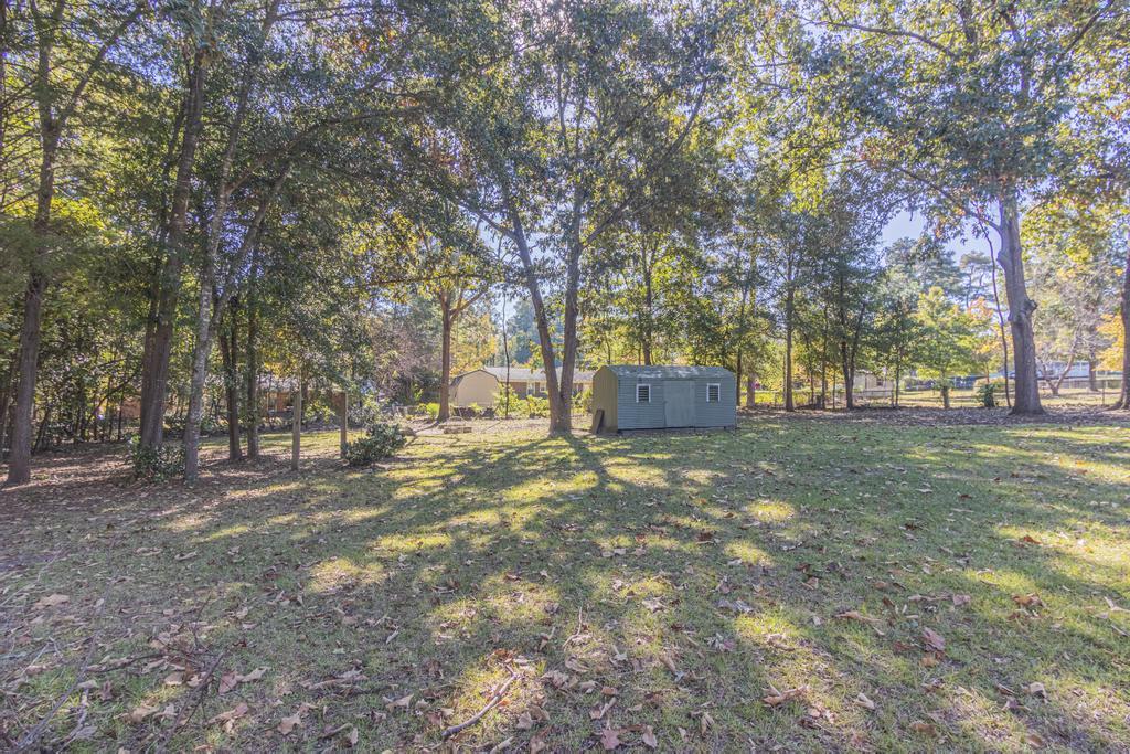 1934 Huntsman Drive Aiken, SC 29803 - Photo 19 of 19 a view of a yard with a tree