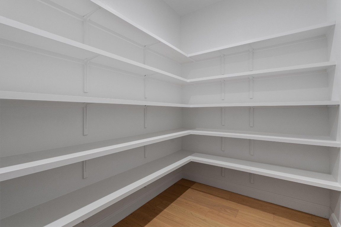 7705 Calcutta Run Drive Jonestown, TX 78645 - Photo 15 of 40 a storage room with wooden floor