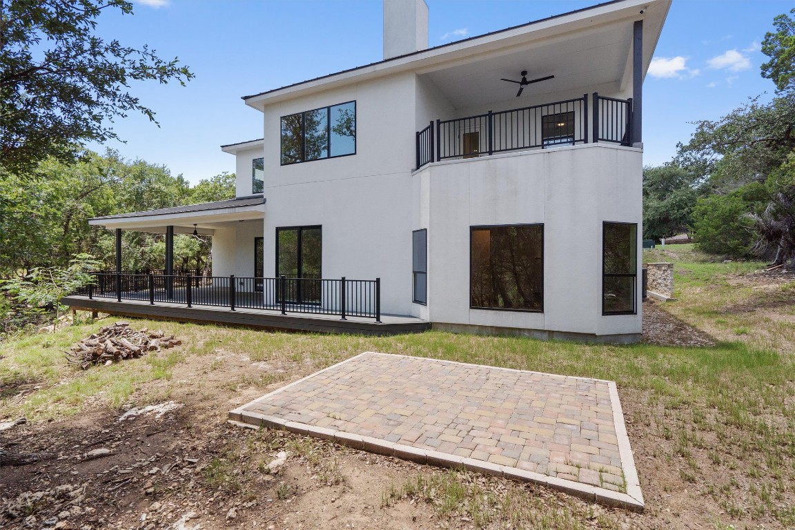 7705 Calcutta Run Drive Jonestown, TX 78645 - Photo 34 of 40 a front view of a house with a yard