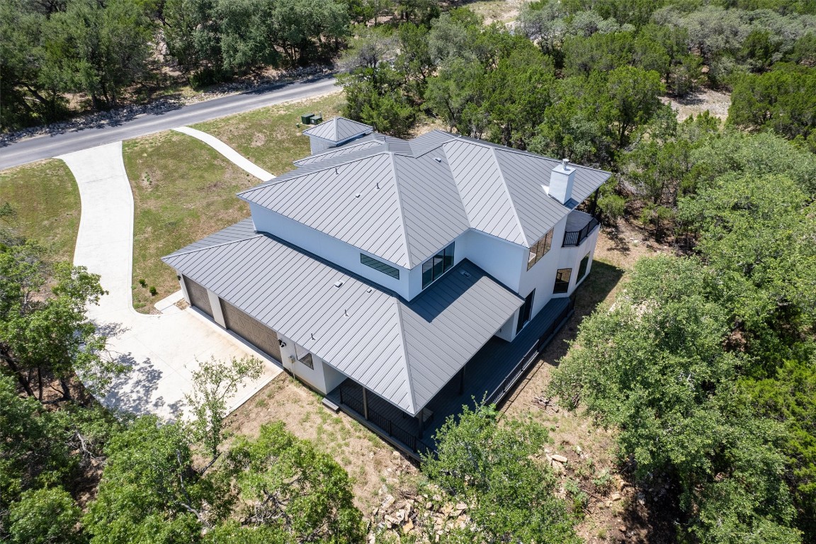 7705 Calcutta Run Drive Jonestown, TX 78645 - Photo 35 of 40 a view of a yard in front of house
