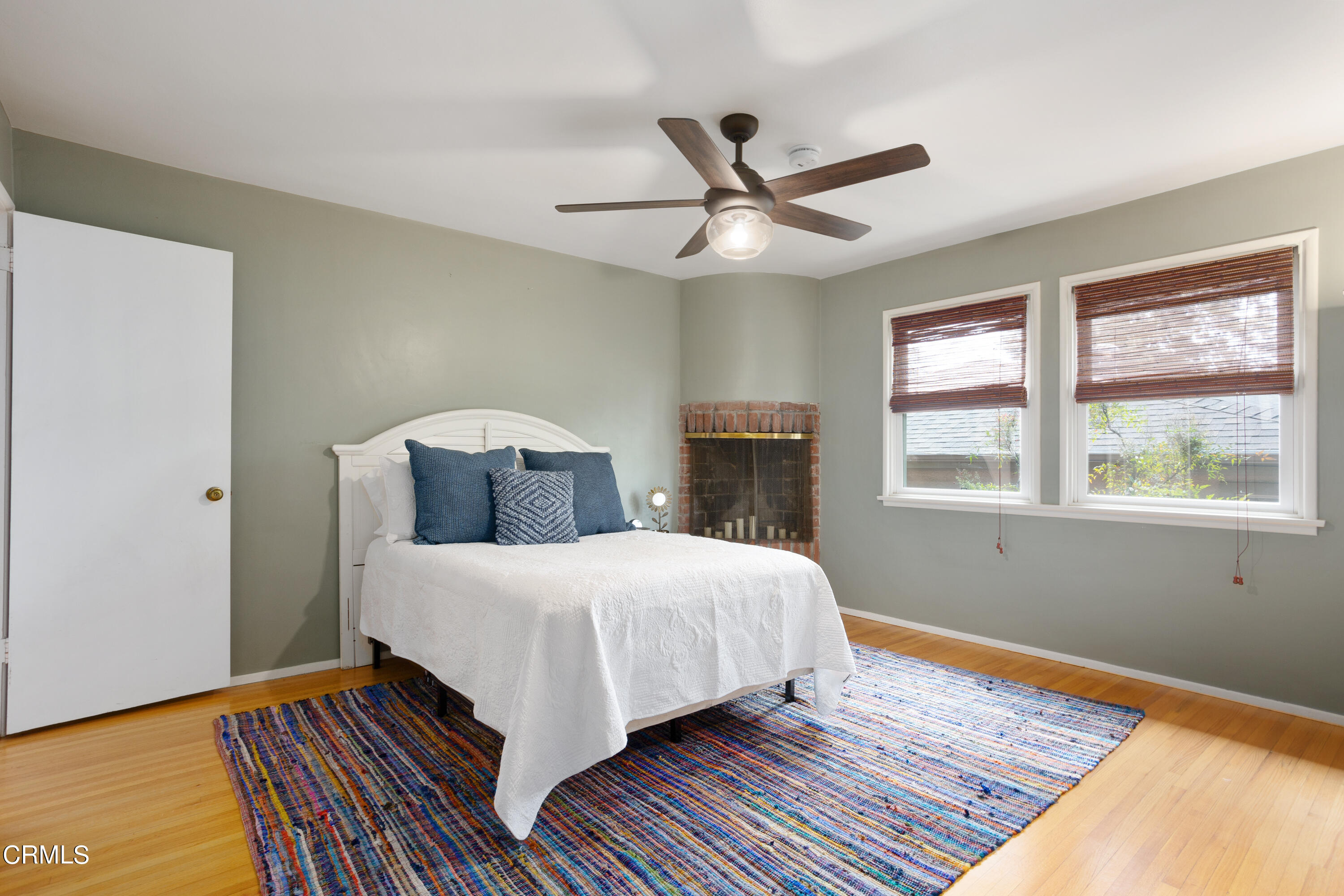 3067 Ewing Avenue Altadena, CA 91001 - Photo 19 of 37 a bedroom with a bed and window