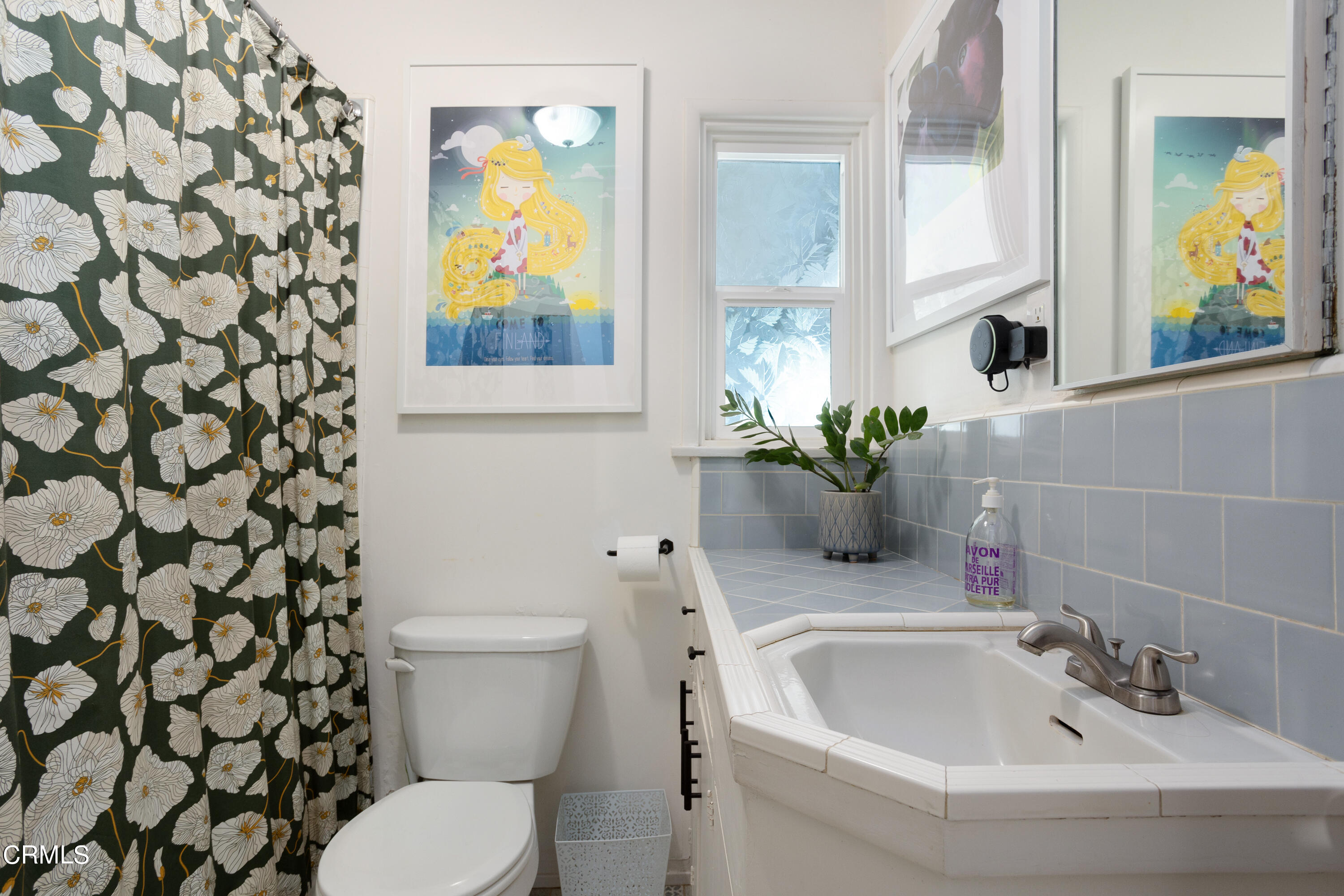 3067 Ewing Avenue Altadena, CA 91001 - Photo 20 of 37 a bathroom with a sink mirror and toilet