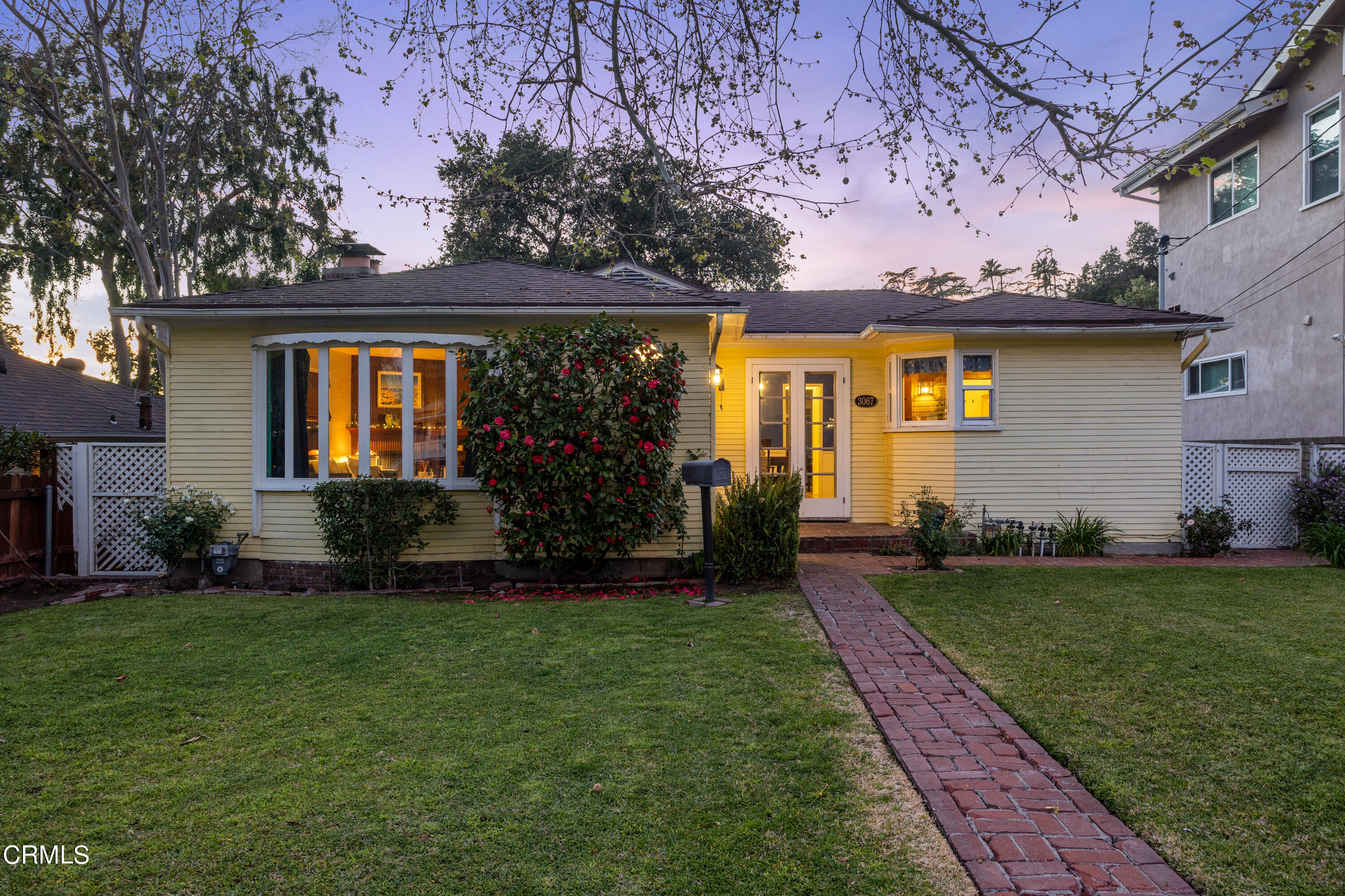 3067 Ewing Avenue Altadena, CA 91001 - Photo 2 of 37 a front view of a house with a yard
