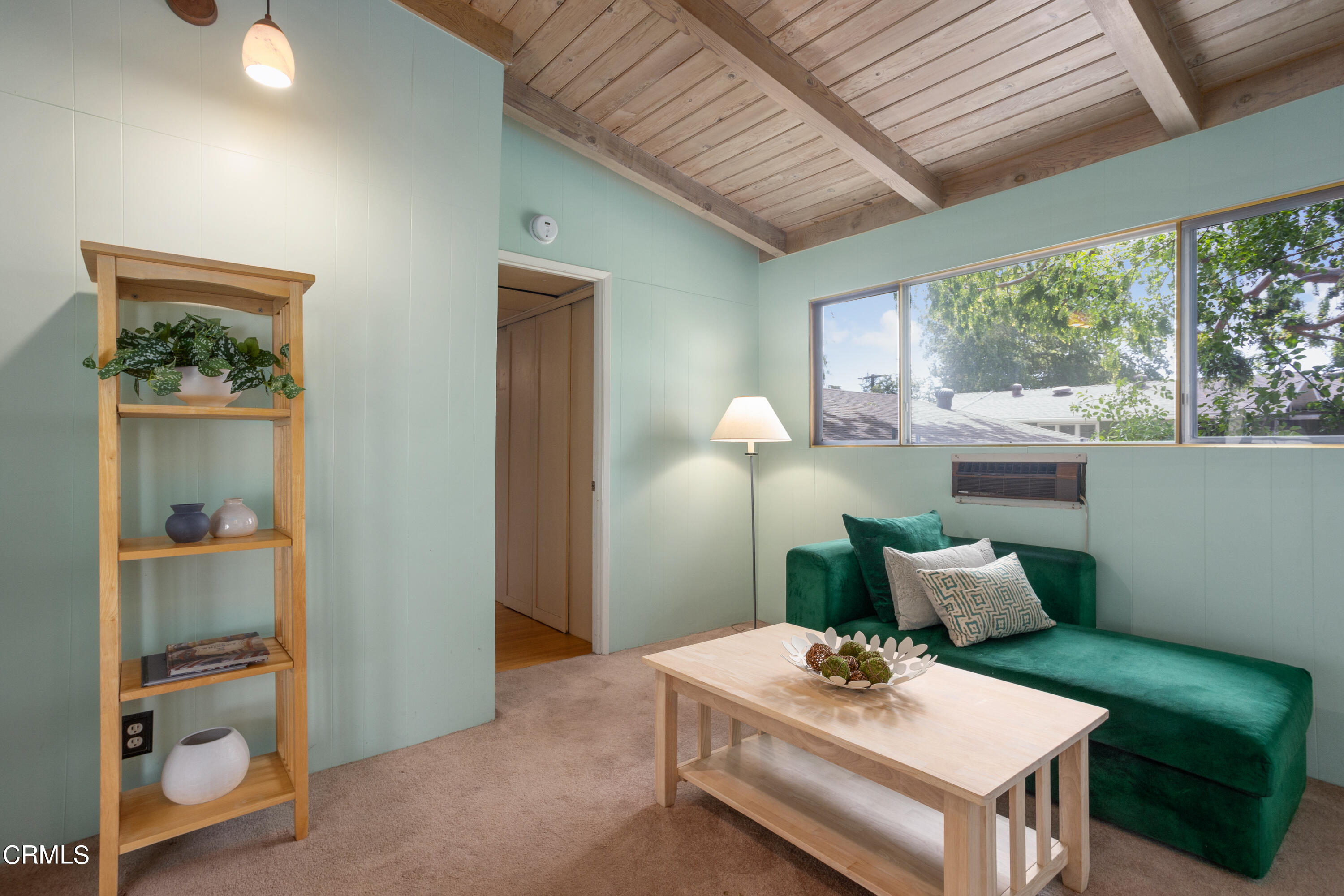 3067 Ewing Avenue Altadena, CA 91001 - Photo 22 of 37 a dining room with furniture and a window