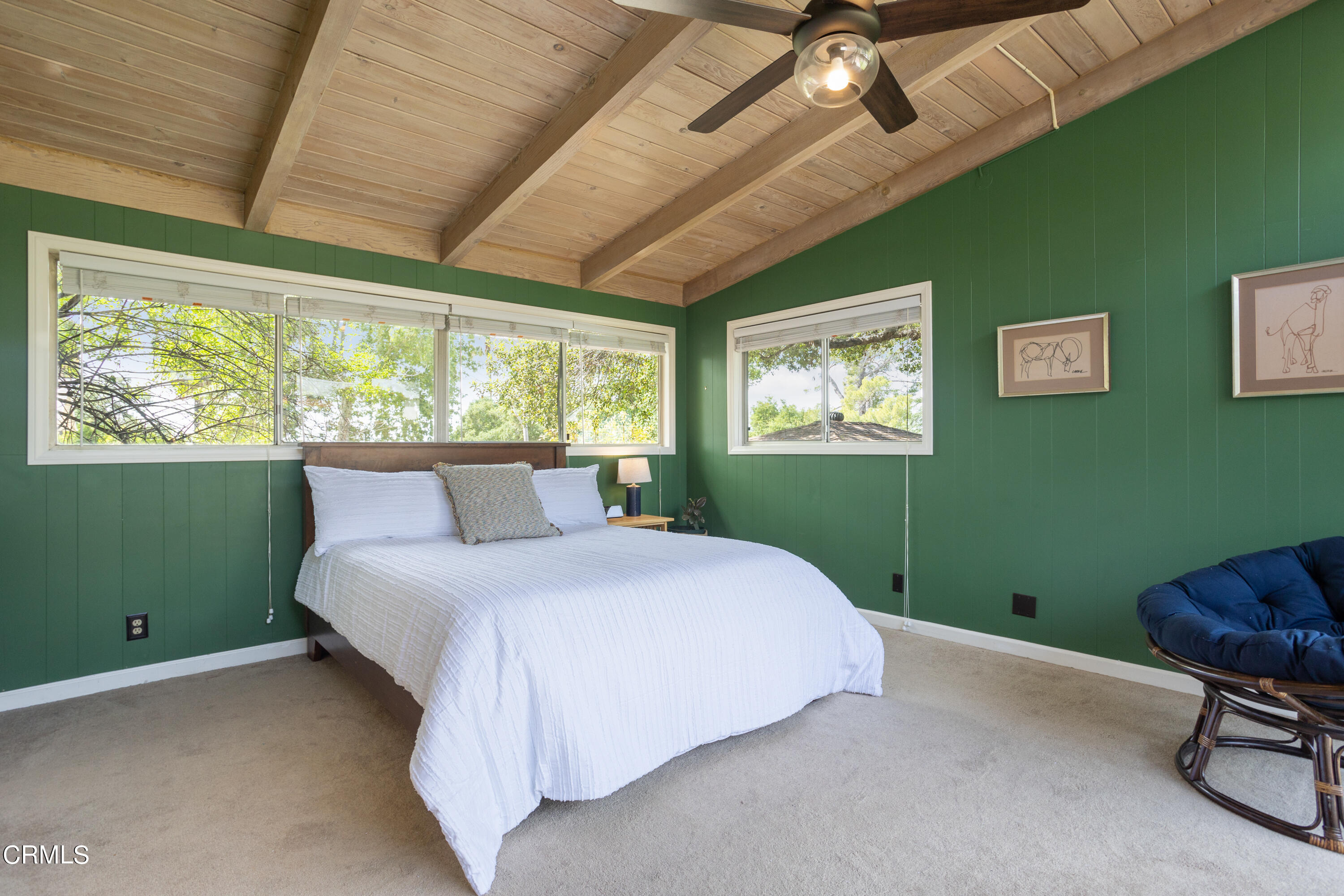 3067 Ewing Avenue Altadena, CA 91001 - Photo 26 of 37 a bedroom with a bed window and a ceiling fan