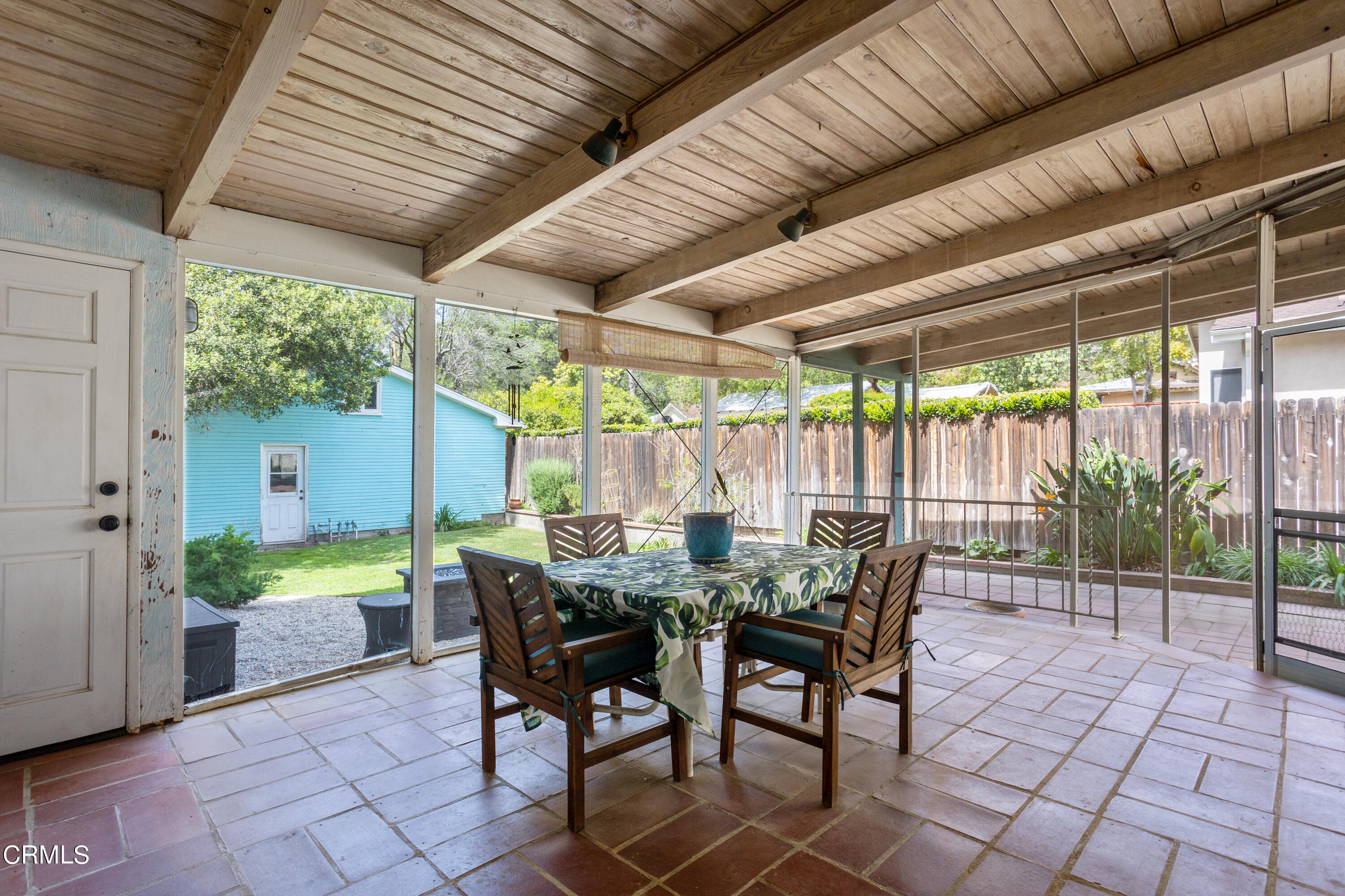 3067 Ewing Avenue Altadena, CA 91001 - Photo 29 of 37 a view of a patio with a table and chairs