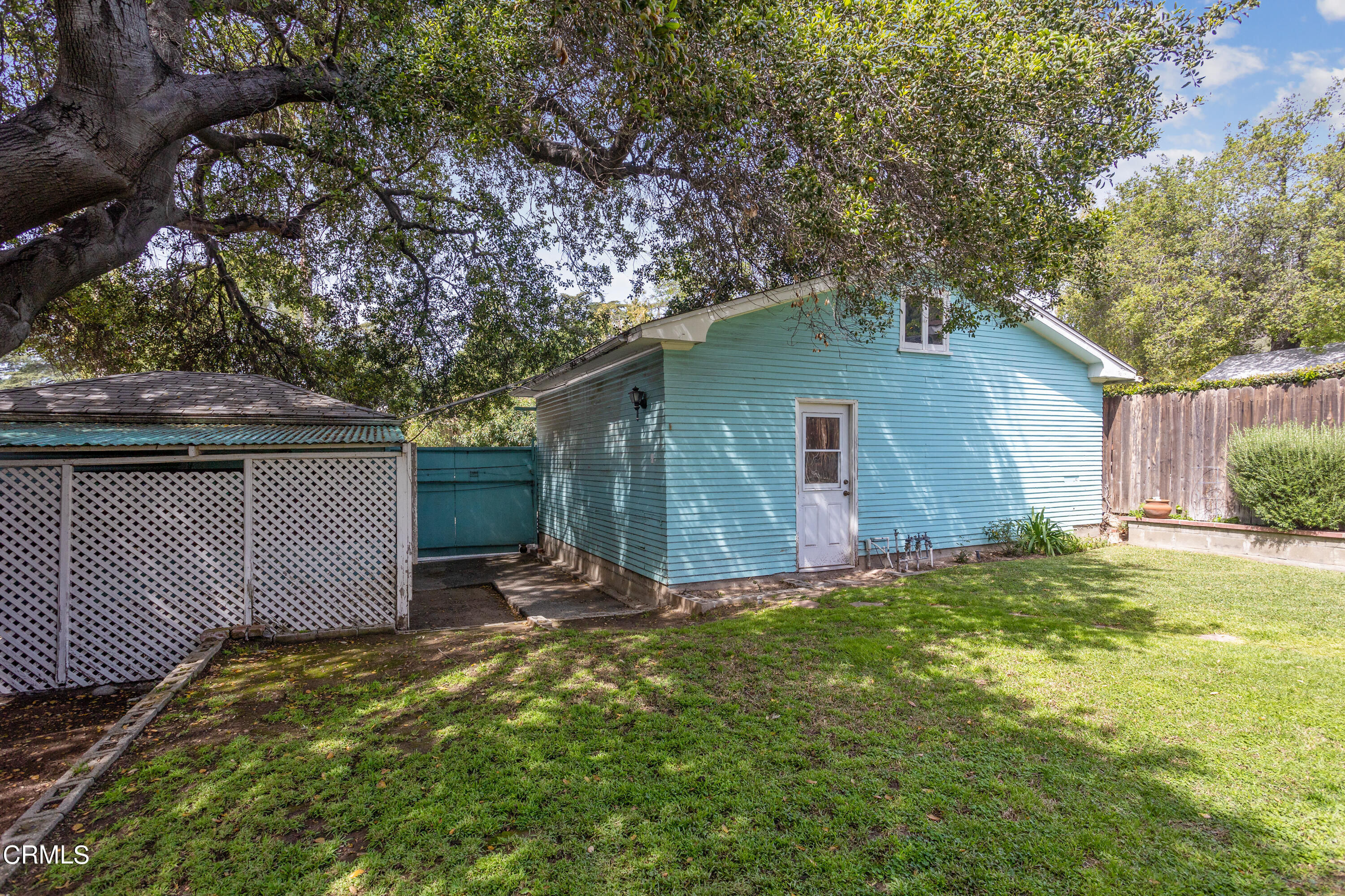 3067 Ewing Avenue Altadena, CA 91001 - Photo 32 of 37 a backyard of a house with table and chairs