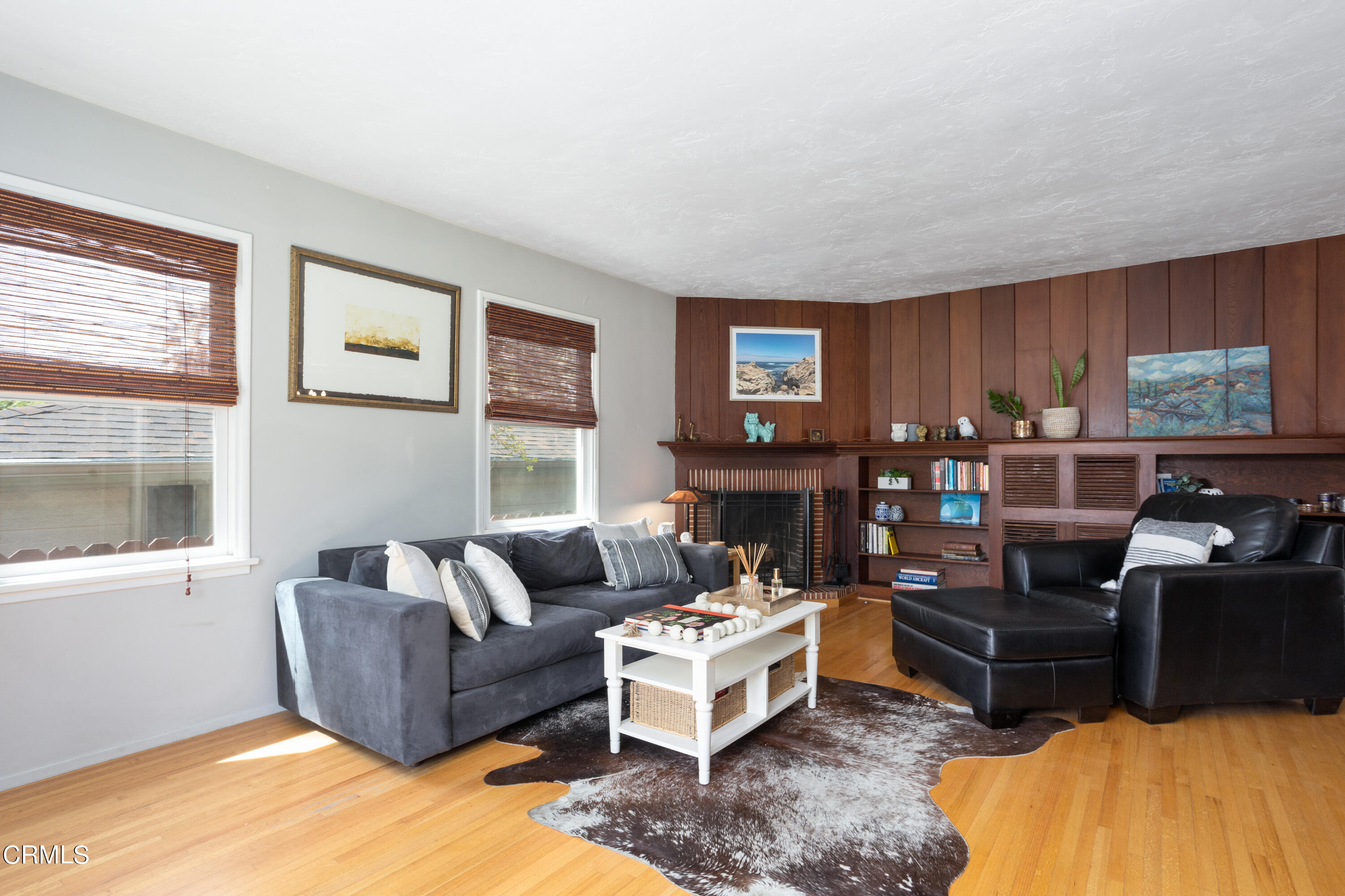 3067 Ewing Avenue Altadena, CA 91001 - Photo 6 of 37 a living room with furniture and a fireplace