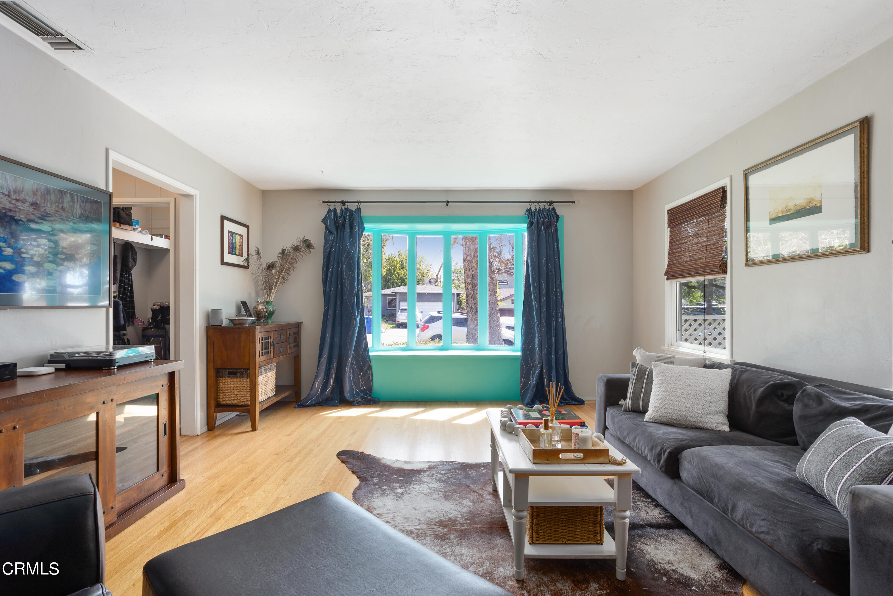 3067 Ewing Avenue Altadena, CA 91001 - Photo 7 of 37 a living room with furniture and a flat screen tv