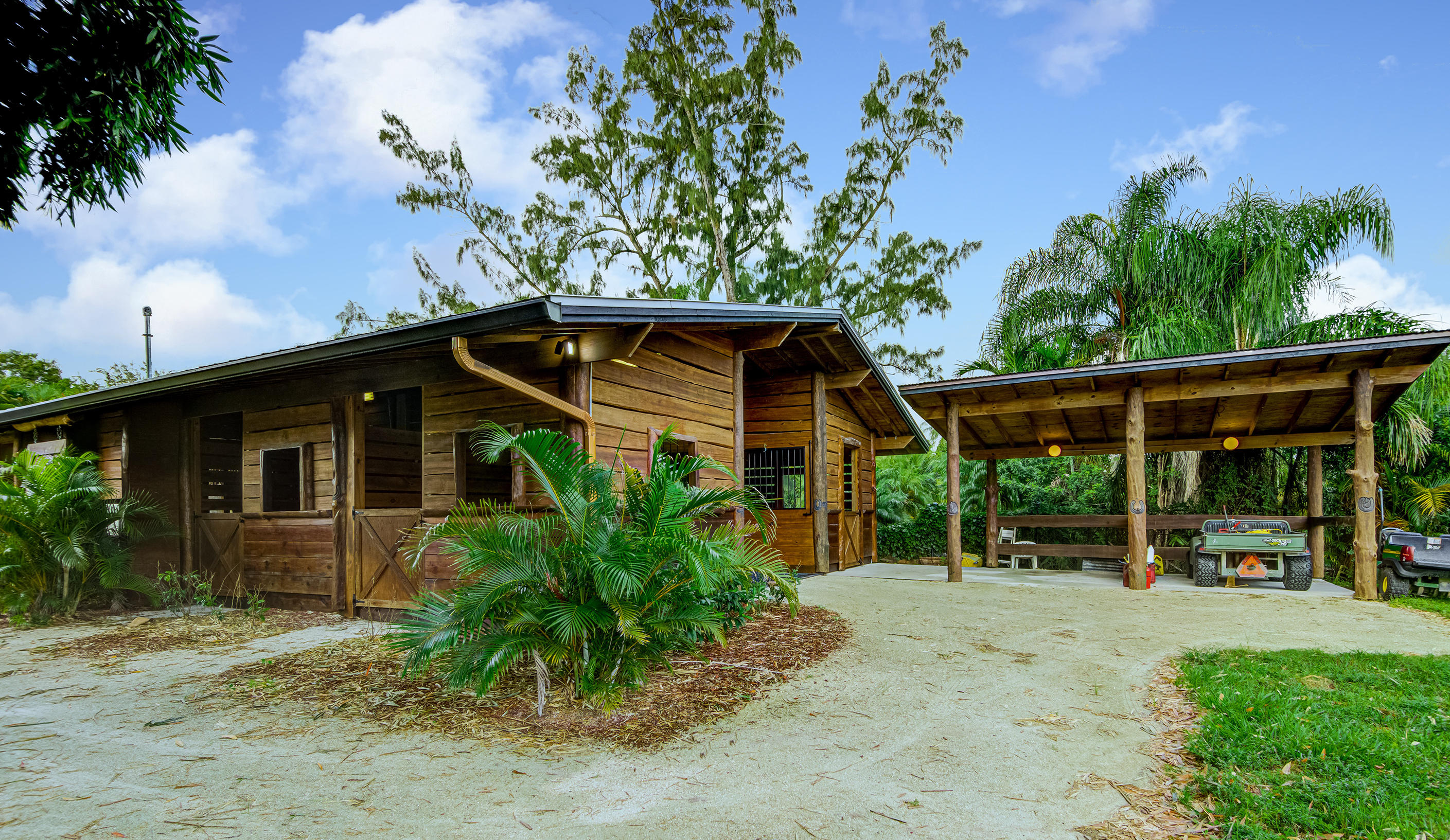 2269 B Road Loxahatchee Groves, FL 33470 - Photo 65 of 102 BARN AND WASH RACKS