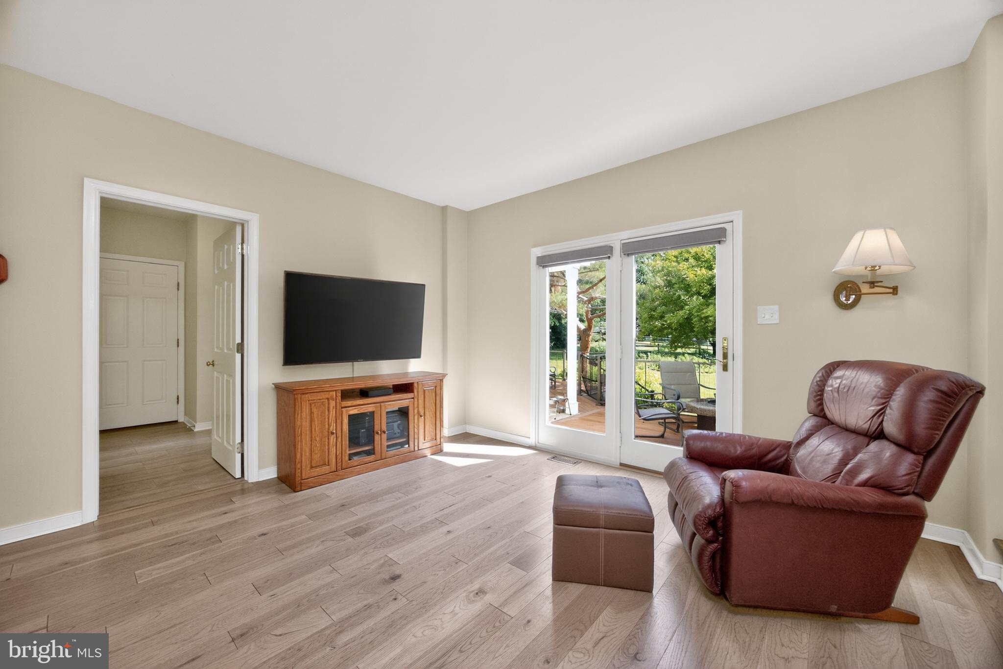 153 East Doe Run Road Kennett Square, PA 19348 - Photo 16 of 76 Family Room with doors to back deck & yard.