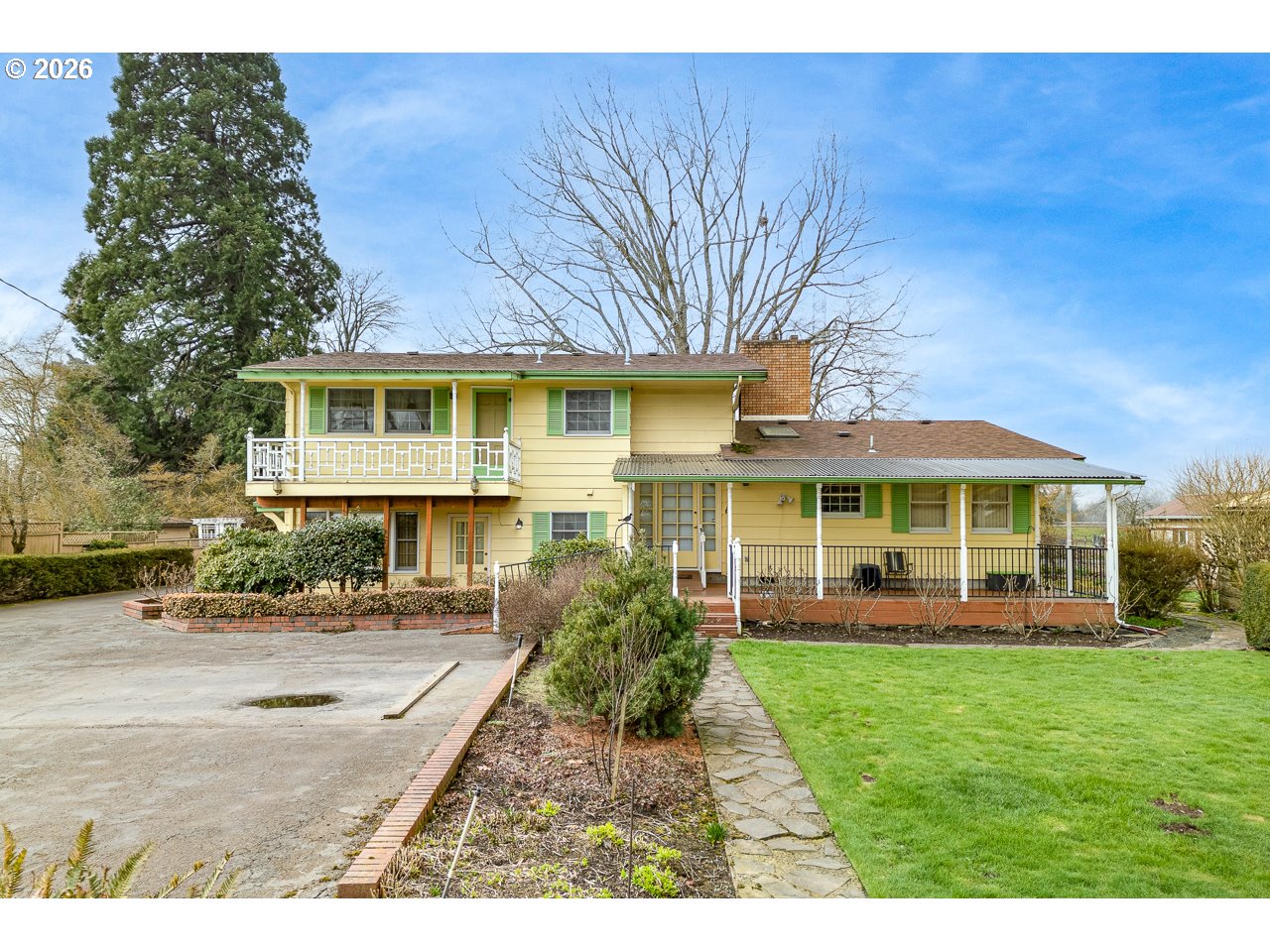 front view of a house with a yard