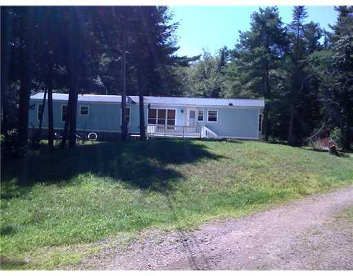 306 Burnt Mill Road Wells, ME 04090 - Photo 13 of 17 Exterior Front. Very privately set,...