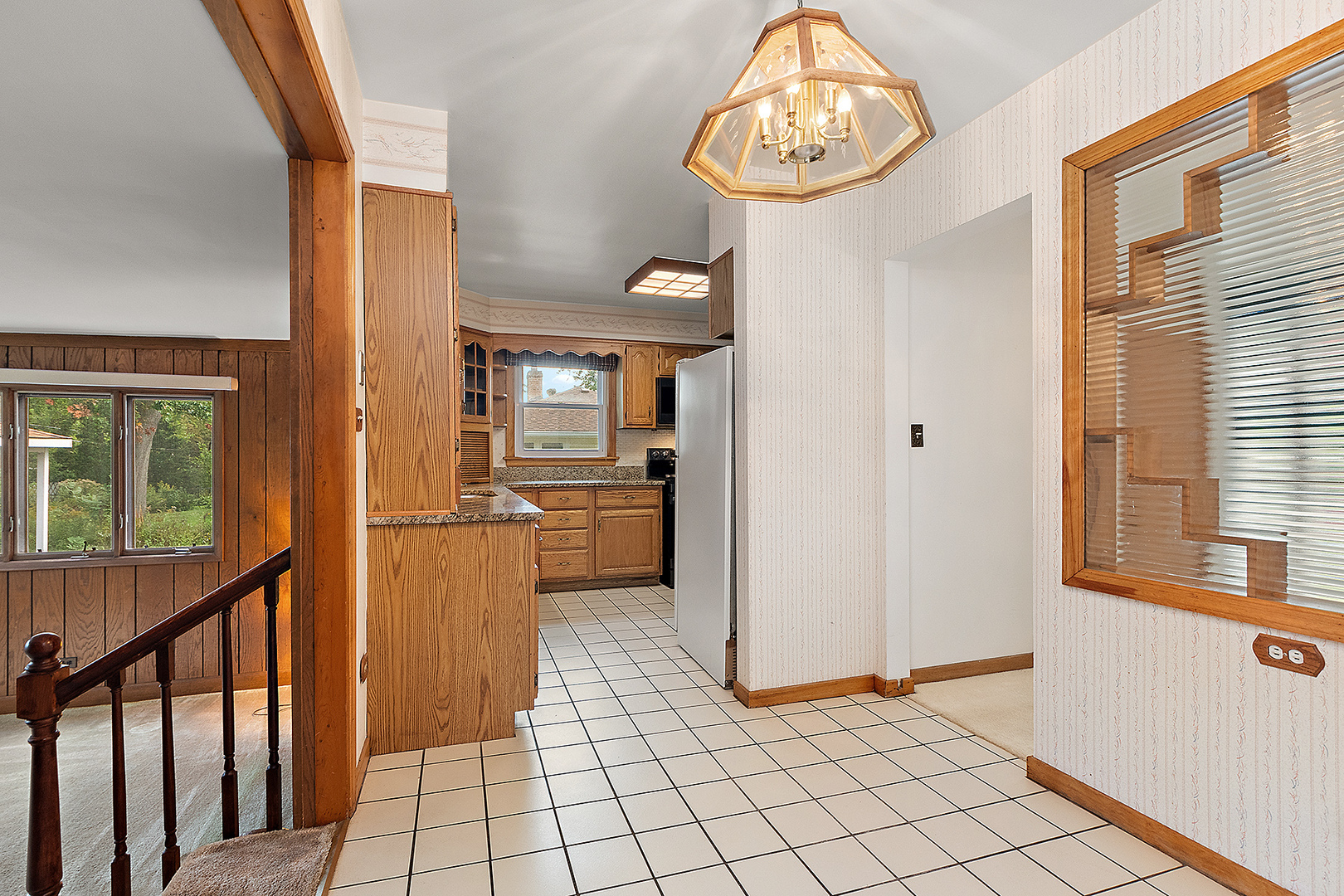 1352 Evergreen Road Homewood, IL 60430 - Photo 11 of 32 a view of a hallway to a livingroom with furniture