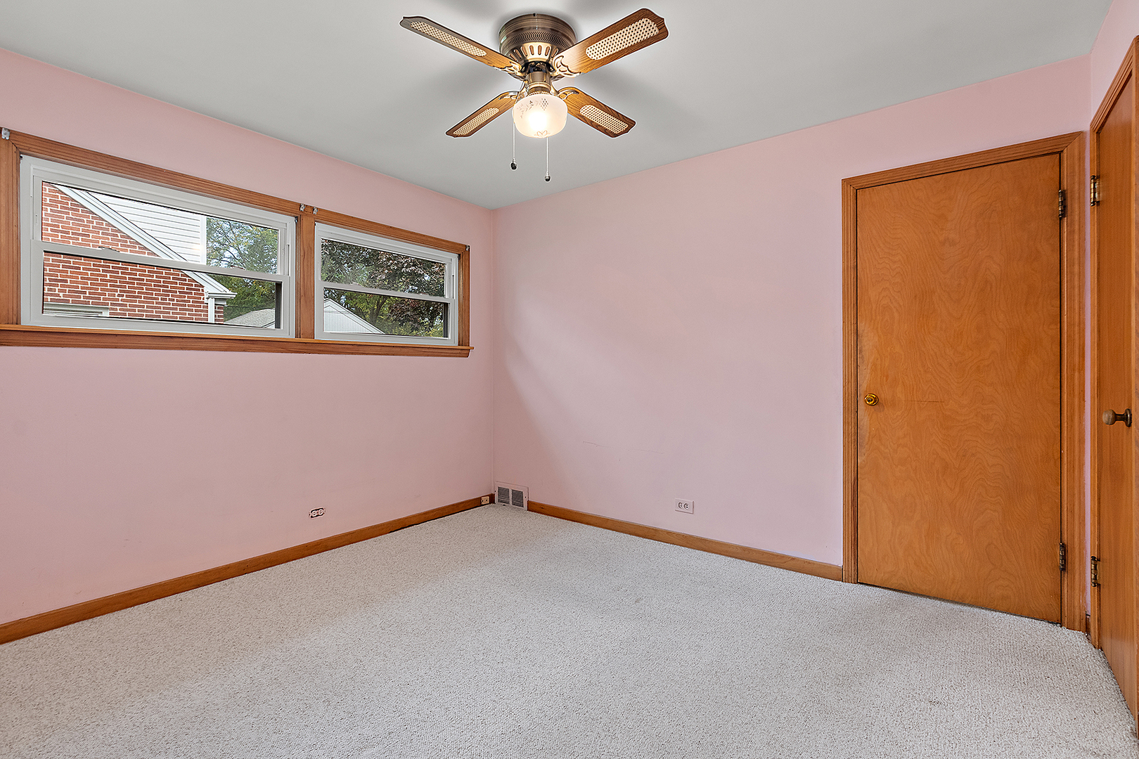 1352 Evergreen Road Homewood, IL 60430 - Photo 16 of 32 an empty room with windows and fan