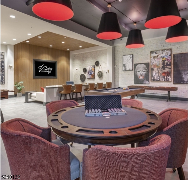 100 Union Street, Unit 429 Elizabeth, NJ 07202 - Photo 14 of 41 a living room with furniture and a large window